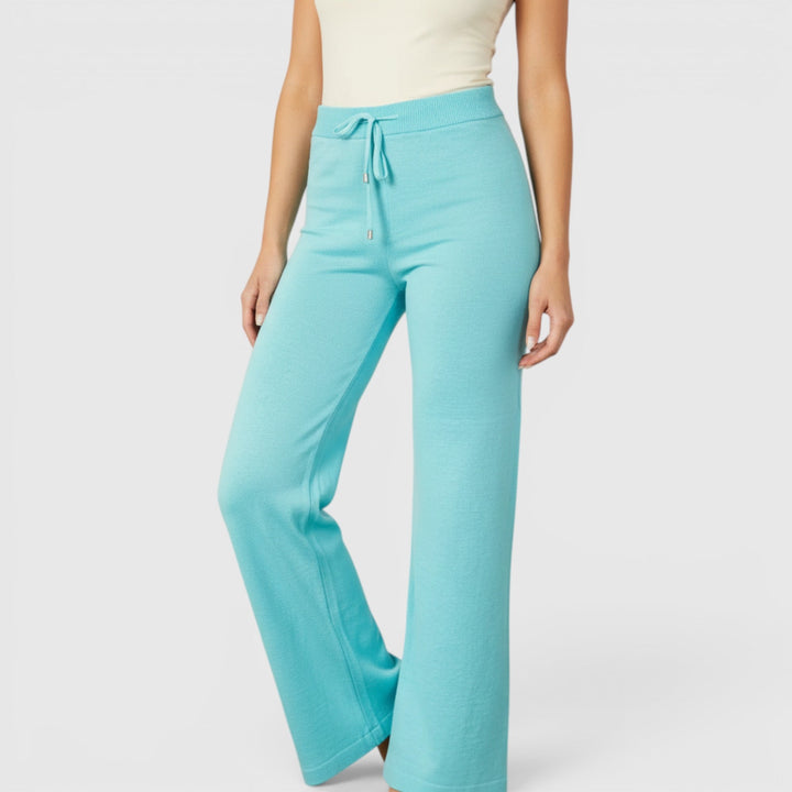 Women's relaxed fit lounge pants, comfortable drawstring design for casual and versatile wear.