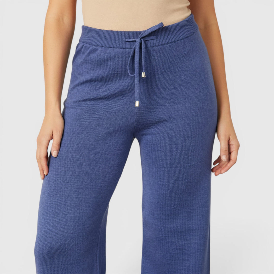 Relaxed fit women's lounge pants in soft fabric, ideal for ultimate comfort & casual style.