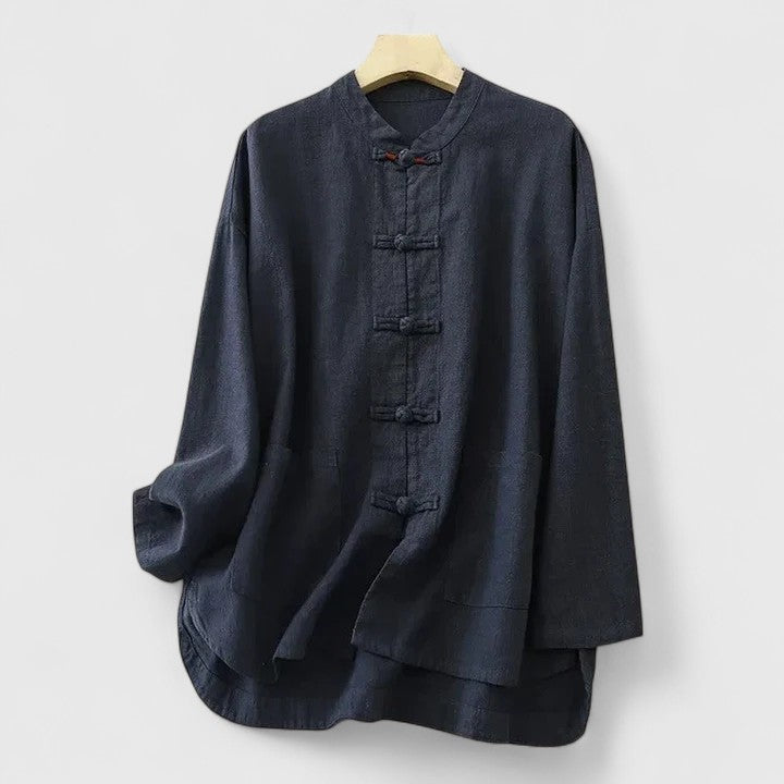 Stylish women's shirt with knot closure, patch pockets & relaxed fit; breathable for comfortable daily wear.