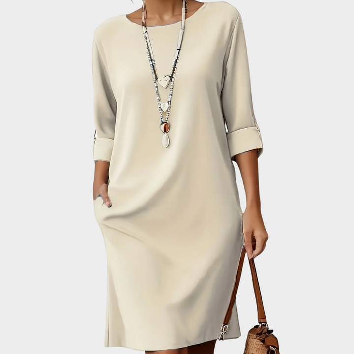 Elegant women's round neck dress, offering effortless style and comfort for everyday and casual wear.