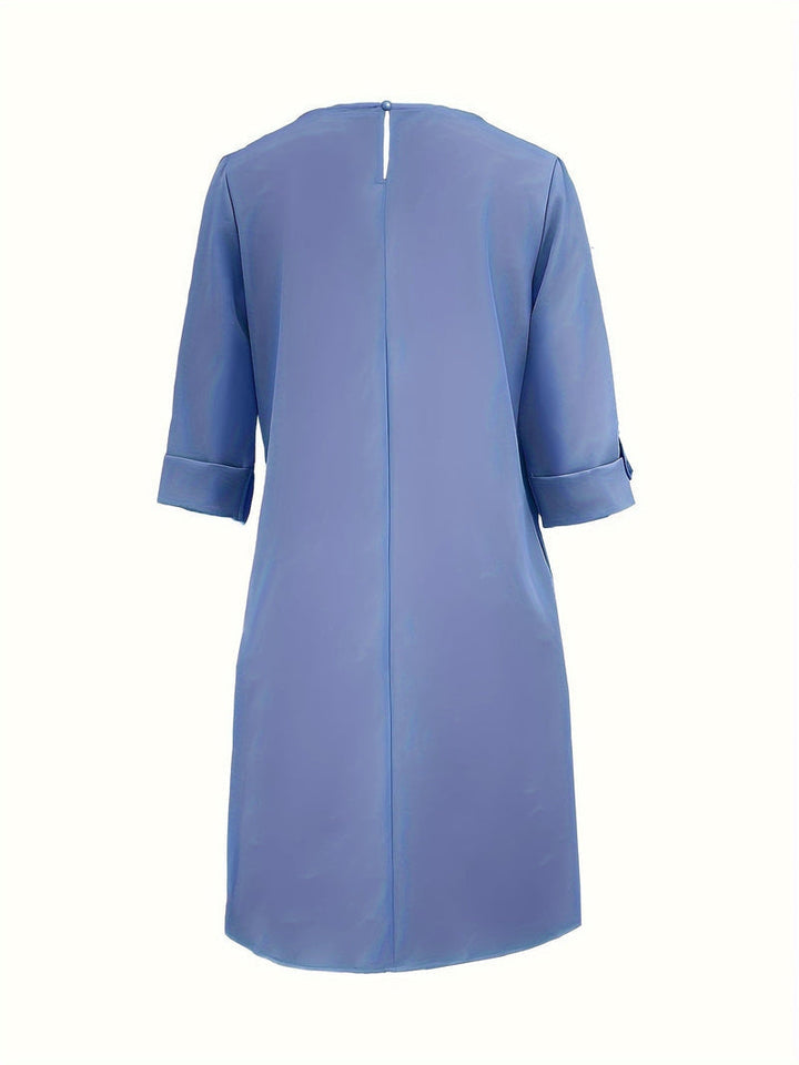 Casual women's round neck summer dress, a comfortable midi for effortless style and everyday wear.