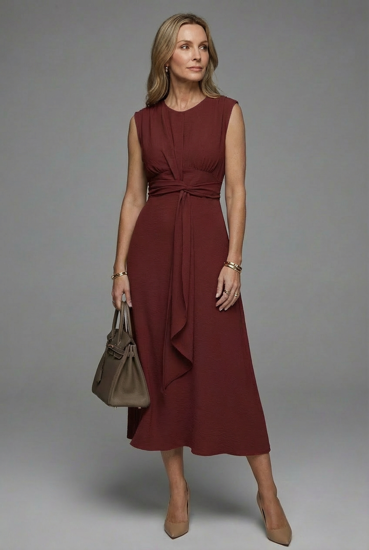 Flattering women's sleeveless midi dress with a comfortable round neck, perfect for everyday chic style.