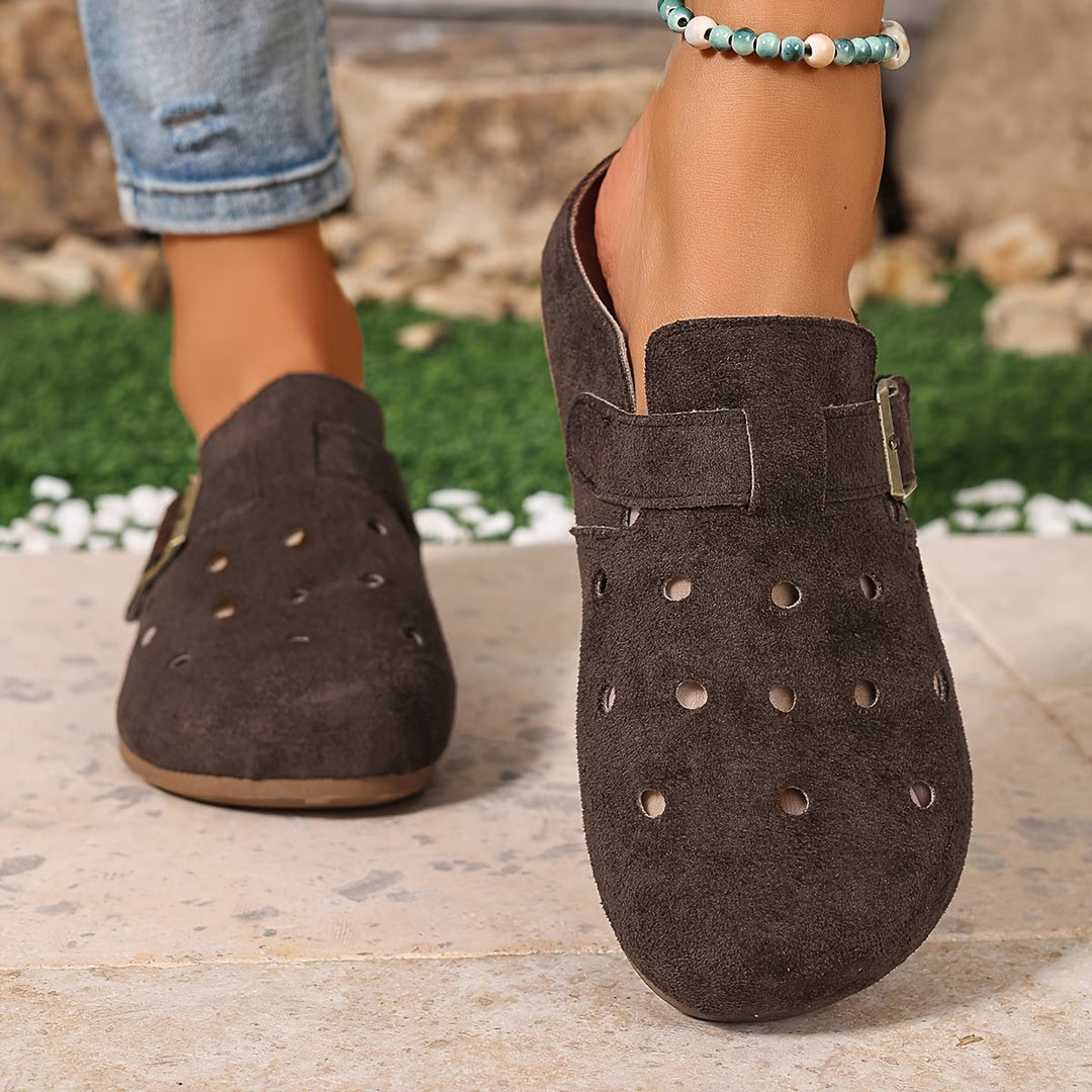 Lightweight women's slip-on clogs with breathable design, perfect comfort shoes for garden, outdoor, or casual use.