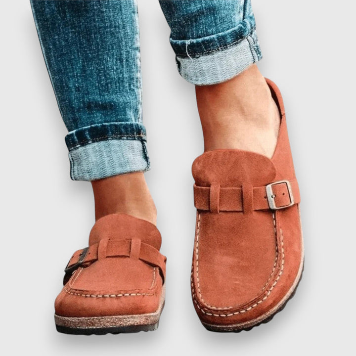Supportive women's sandals for everyday wear, featuring comfortable arch support for happy feet.