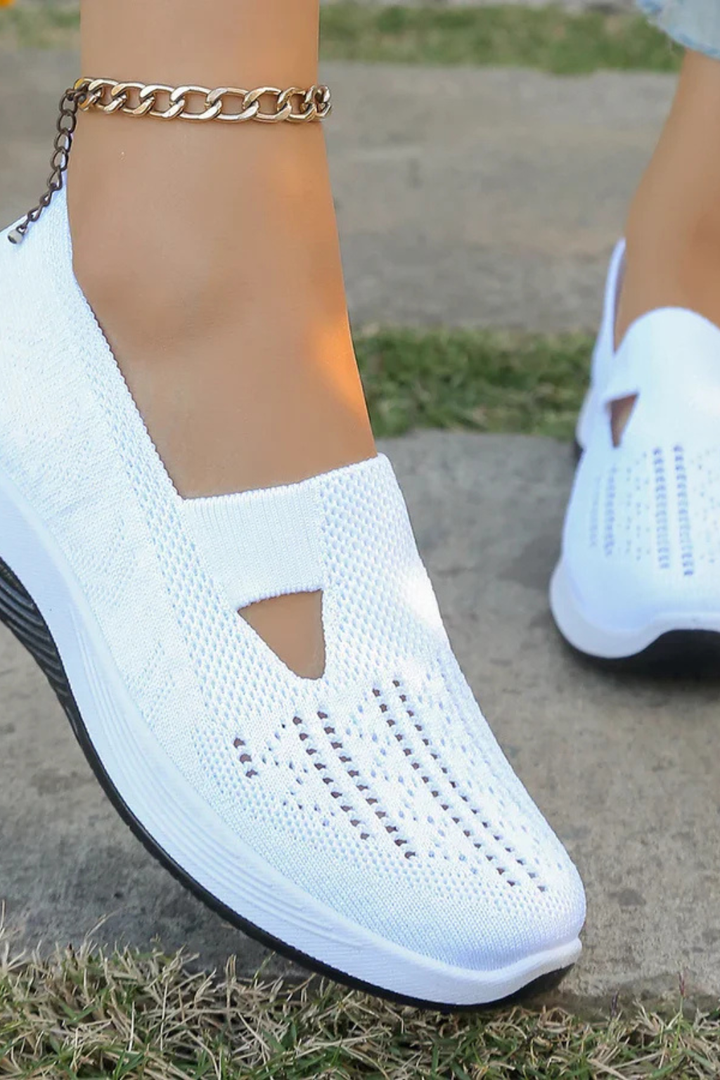 Women's lightweight slip-on trainers, breathable and comfortable casual sneakers for daily wear.