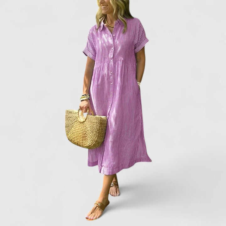 Striped women's dress, long sleeve, comfortable midi length for versatile wear.