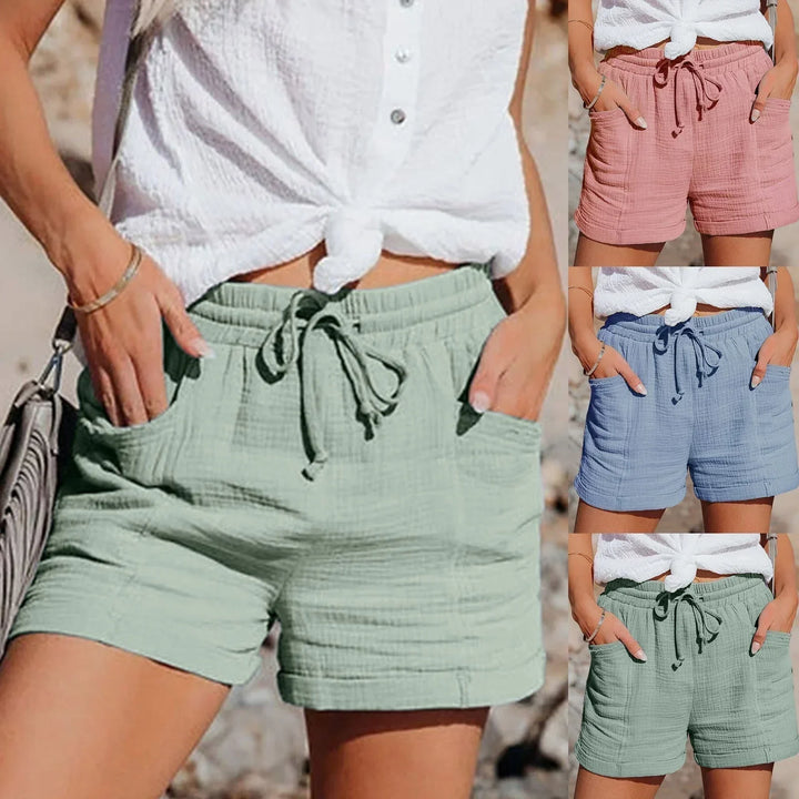 Pink women's relaxed fit summer shorts. Ultra-comfortable & breathable, perfect for casual outdoor activities.
