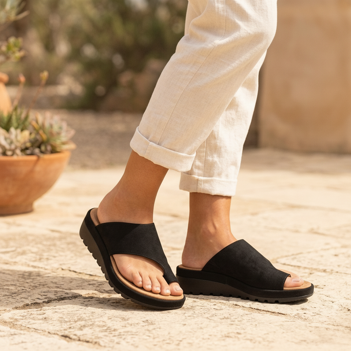 Women's comfortable toe ring slide sandals in a stylish design, perfect for everyday wear.