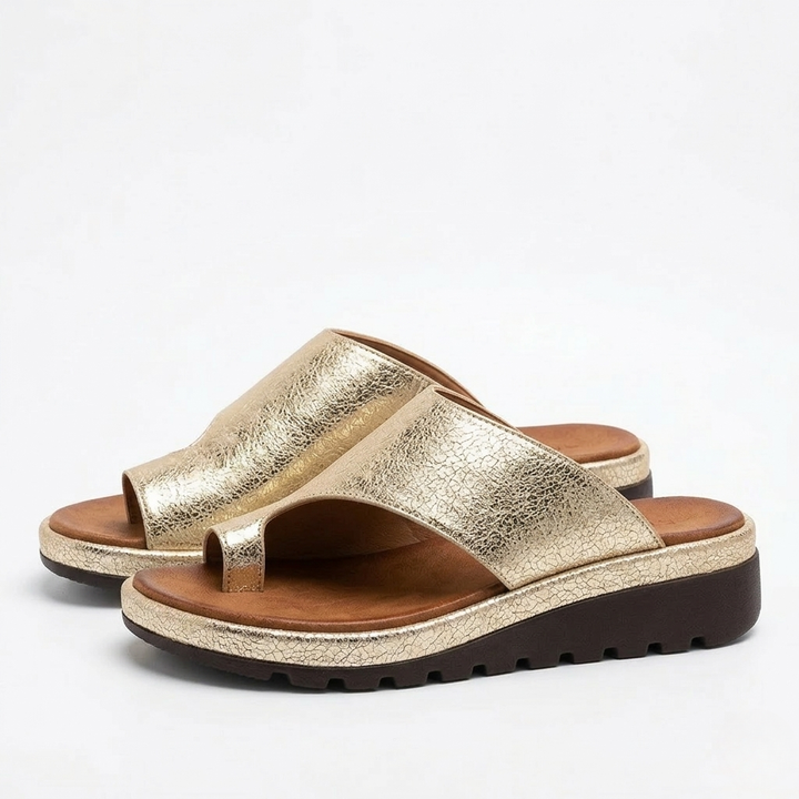 Women's yellow toe ring wedge slide sandals, offering a blend of style, comfort & stability for summer.