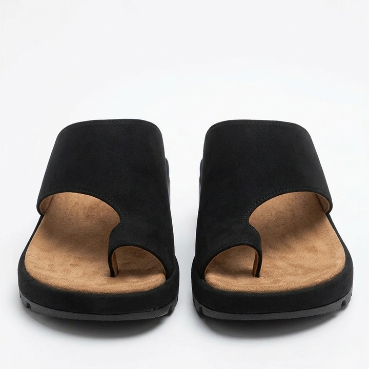Fashionable women's toe ring slide sandals in multiple colors, featuring a comfortable, elegant design.