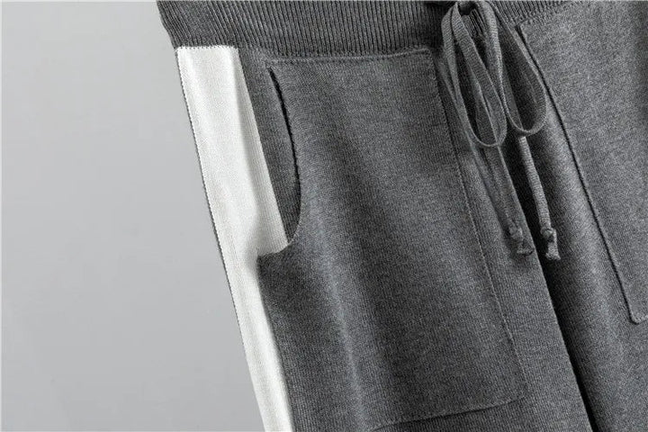Fashionable women's two-piece outfit: comfortable long sleeve top & versatile joggers. Great for everyday wear.