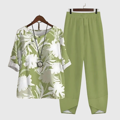 Women's two-piece outfit: comfy short-sleeve top & matching lounge pants, stylish & relaxed.