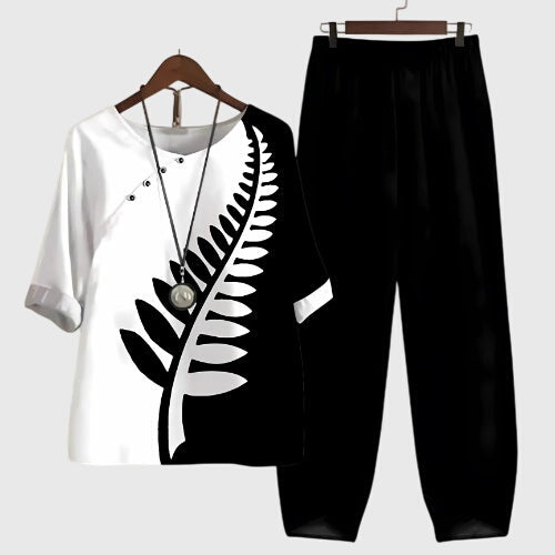 Relaxed fit women's two-piece lounge set, featuring a stylish top and comfortable wide-leg pants.