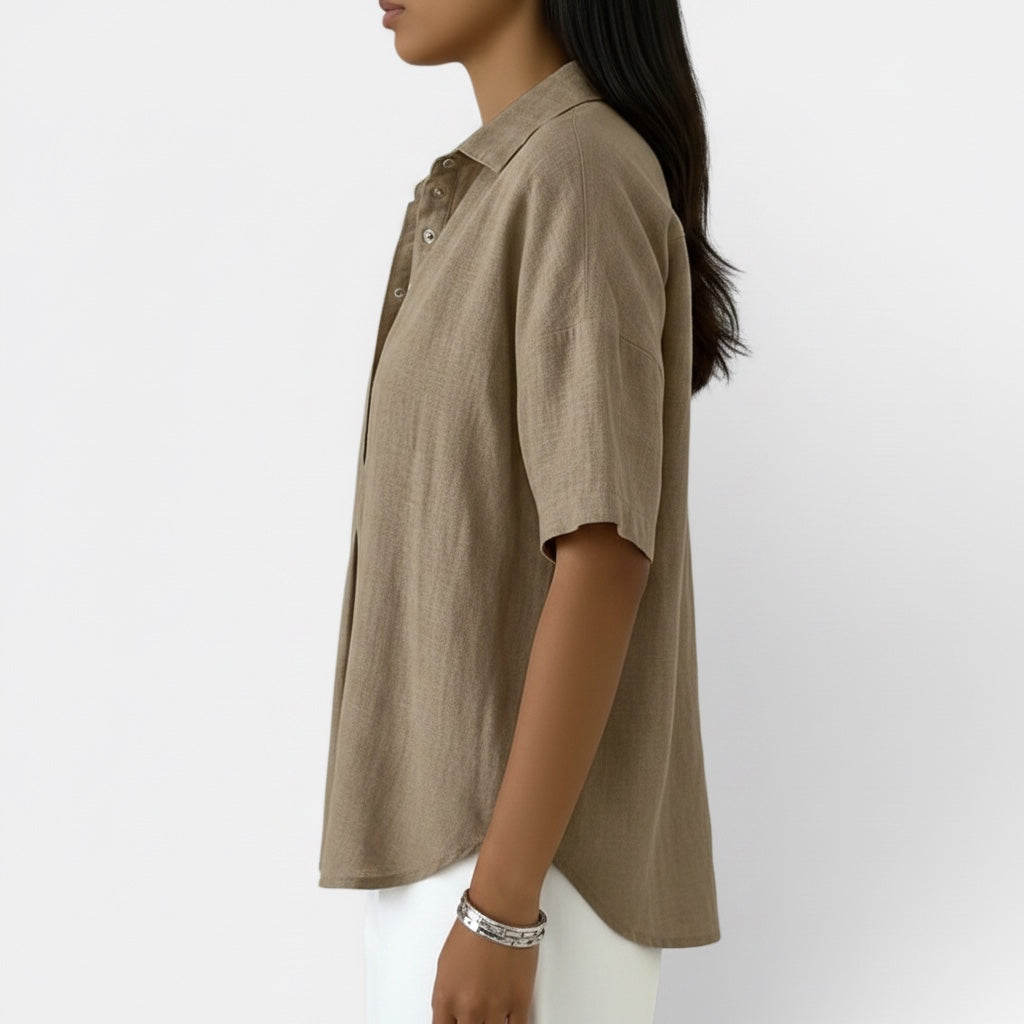 Women's elegant V-neck blouse with short sleeves, ideal for comfortable daily wear. A versatile women's shirt top.