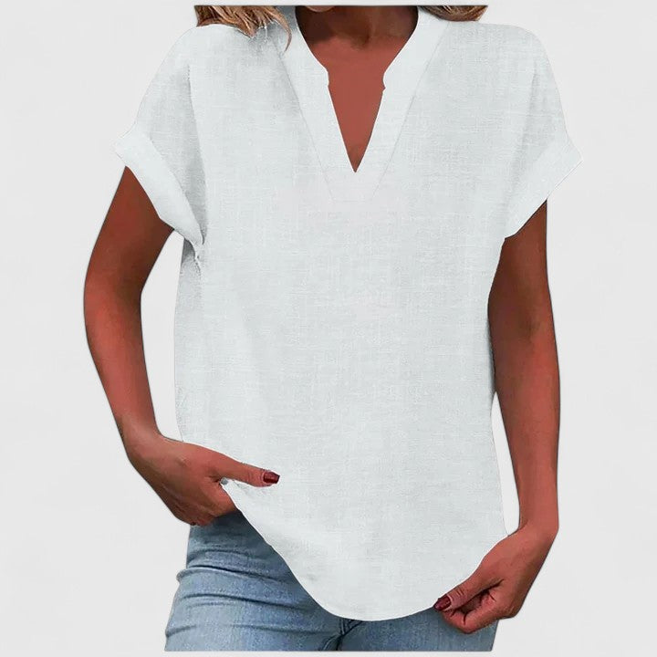 Comfortable V-neck women's blouse, elegant top for spring/summer, versatile casual wear.