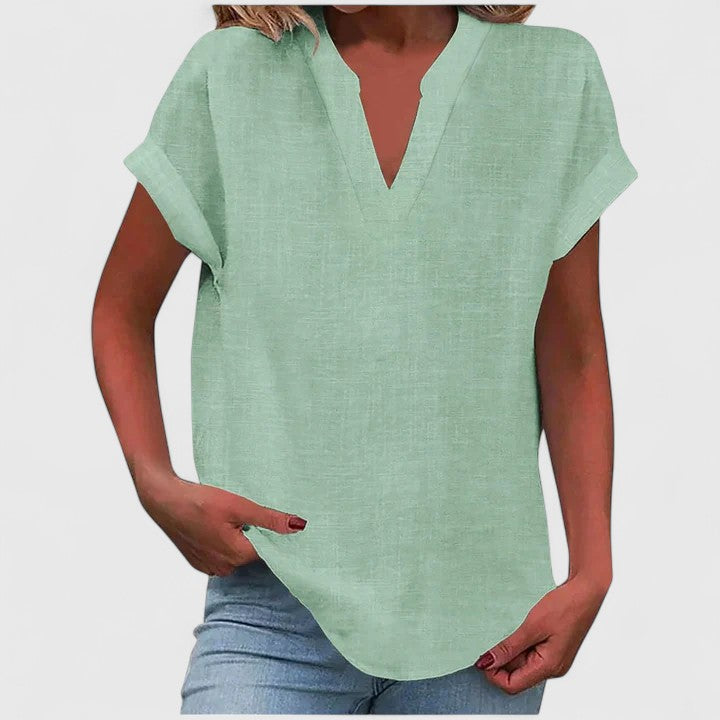 Stylish V-neck women's blouse, comfortable for summer fashion, versatile casual & work top.
