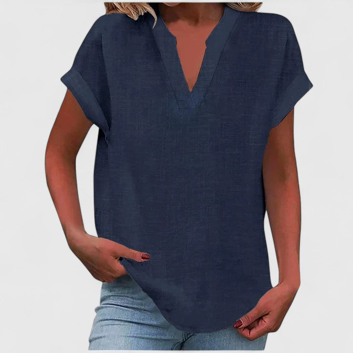 Elegant V-neck women's short sleeve blouse, perfect for spring fashion, comfortable office wear.