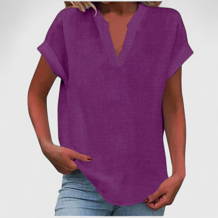 Elegant V-neck women's top for effortless style, ideal for spring fashion & casual wear.