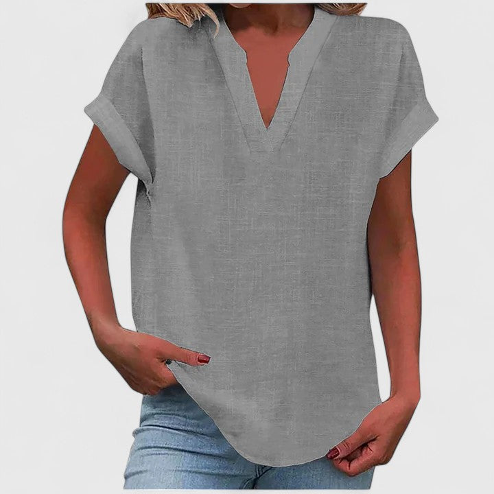 Short sleeve V-neck blouse for women, elegant and comfortable, ideal for casual and office wear.