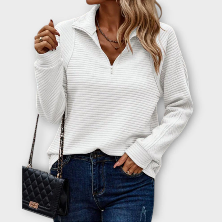 Elegant women's V-neck knit jumper with stylish zipper detail. Long sleeve pullover for versatile fashion.