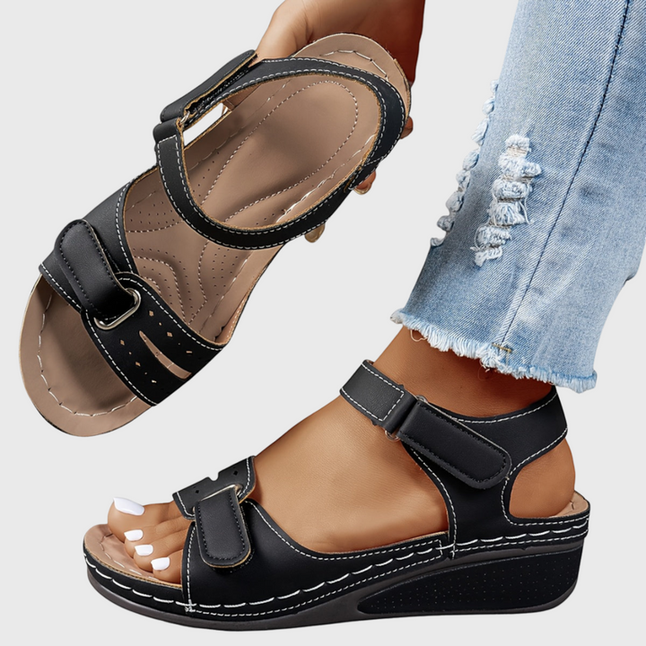 Everyday wear women's wedge sandals. Comfortable, adjustable straps, ideal summer footwear for casual style.