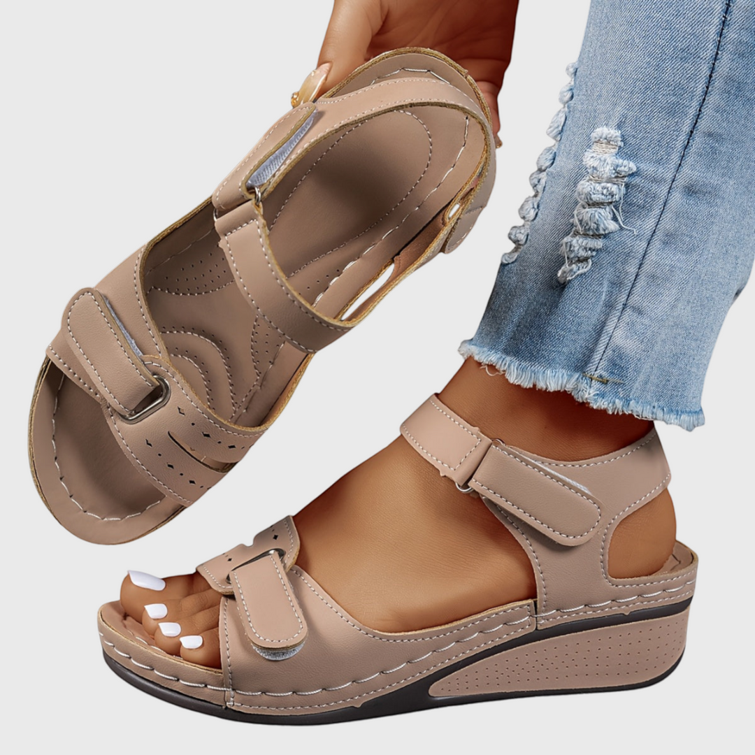 Comfortable women's wedge sandals, open-toe design & adjustable straps. Great for summer and all-day wear.