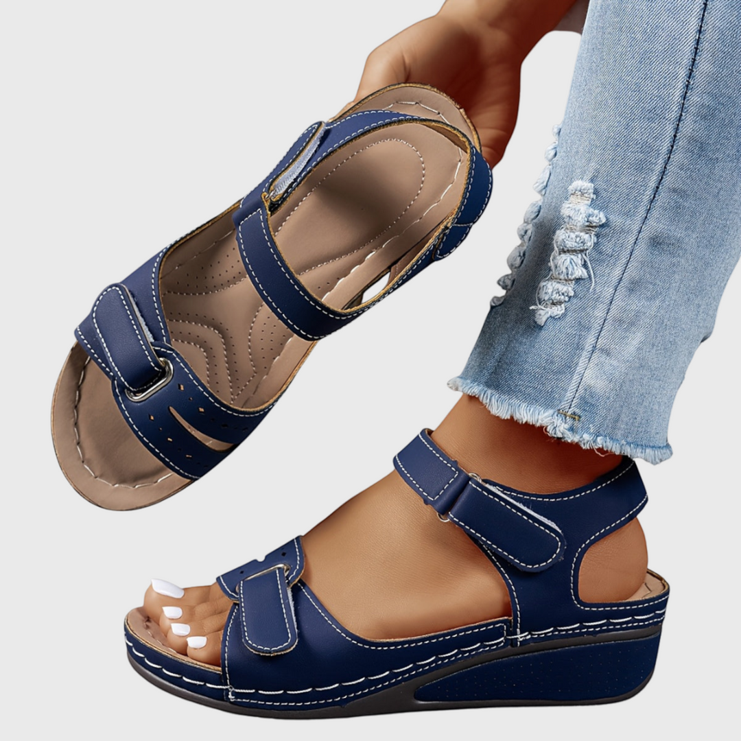 Women's summer footwear: comfortable wedge sandals with adjustable straps & an elegant open-toe design.