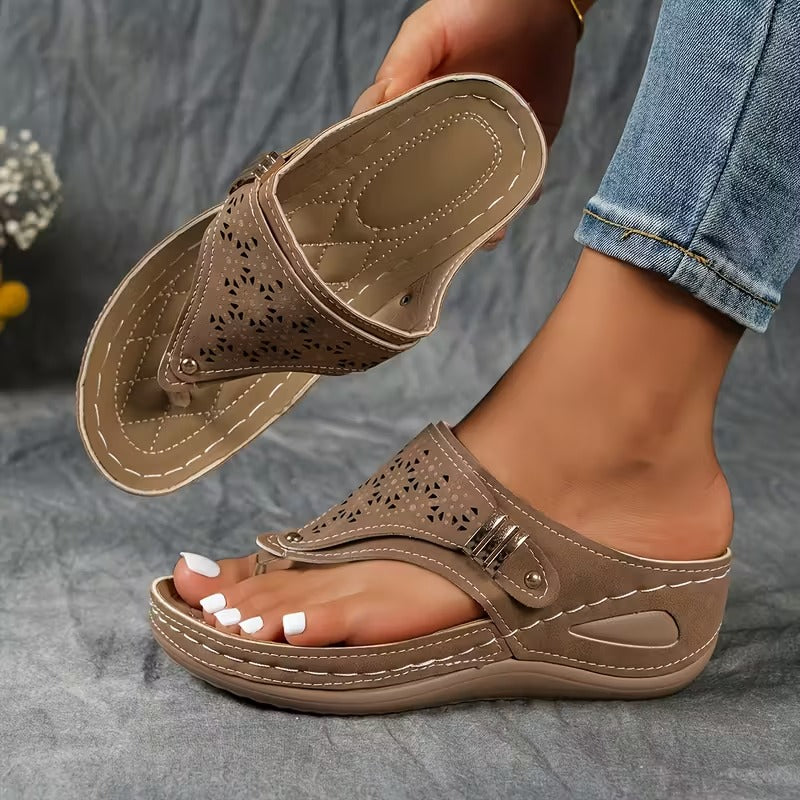 Supportive women's slip-on wedge sandals with arch support, designed for comfortable all-day walking.