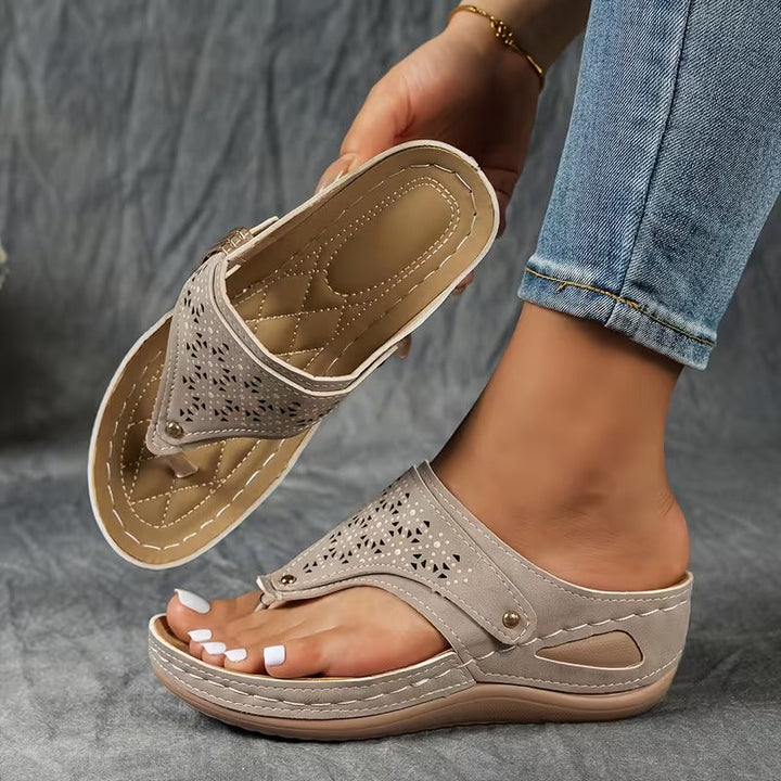 Women's slip-on wedge sandals, offering superior arch support & comfort for all-day summer walking.