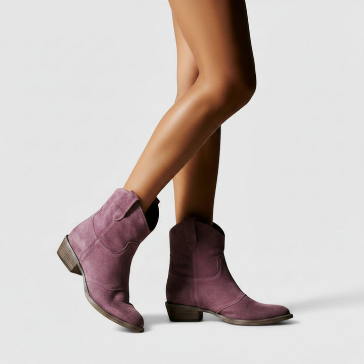 Women's comfortable and stylish western ankle boots, versatile flat heel design.