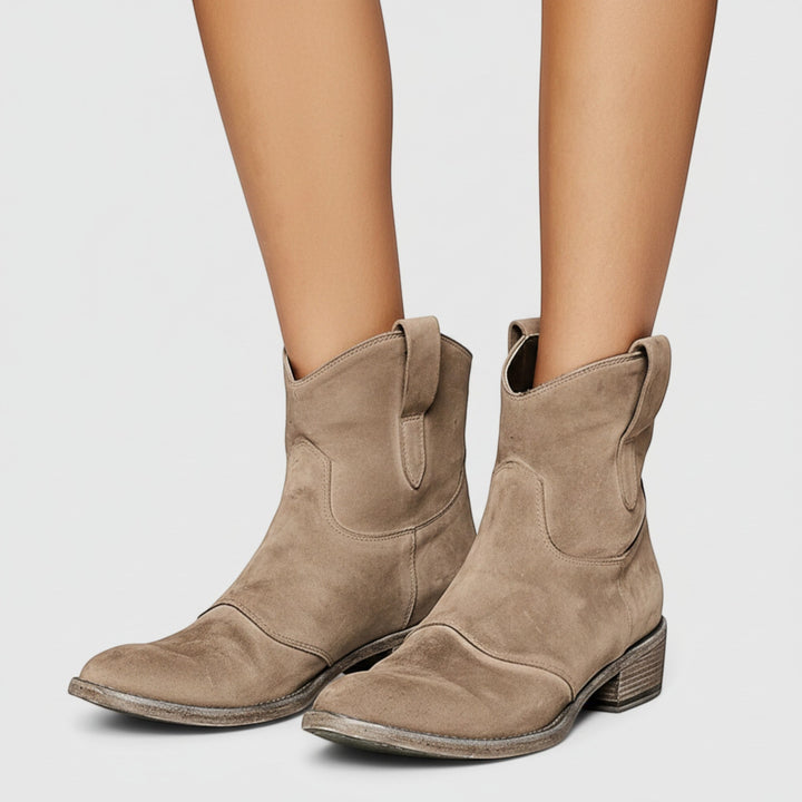 Black women's western ankle boots, comfortable and stylish for any outfit.