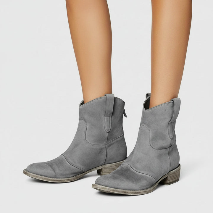 Pink women's stylish western ankle boots, comfortable and fashionable for a unique look.