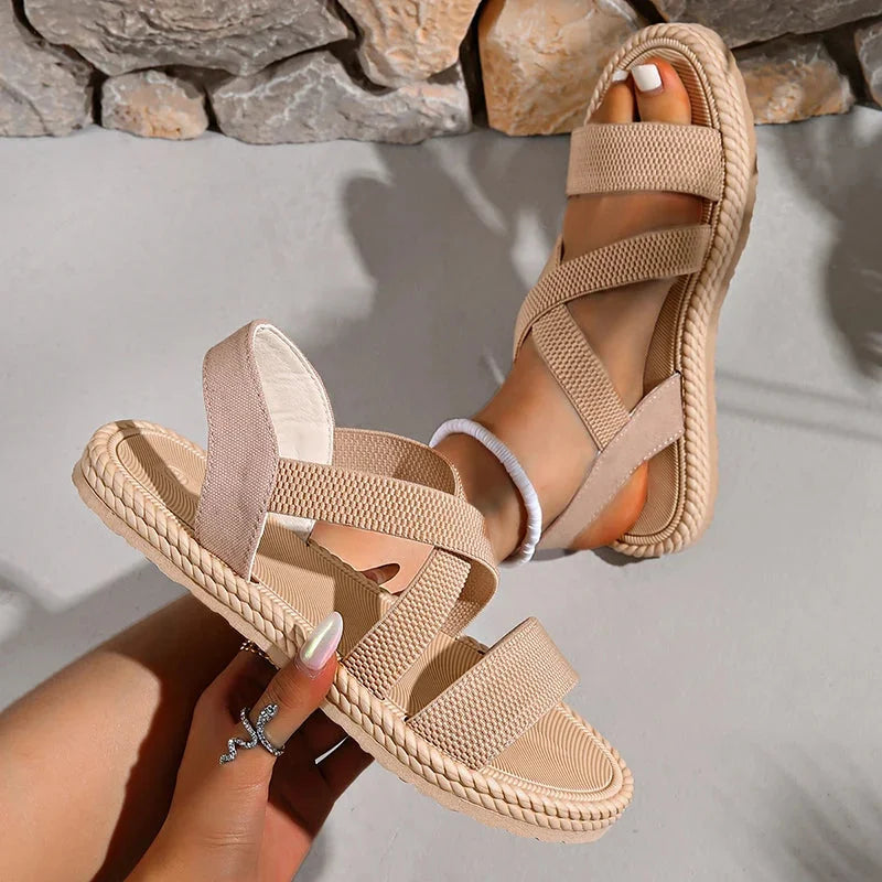 Comfortable espadrille sandals for women, ideal for beach or holiday, with a braided sole & criss-cross design.