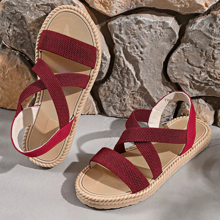 Braided sole espadrille sandals for women, featuring a comfortable woven design and elastic straps.