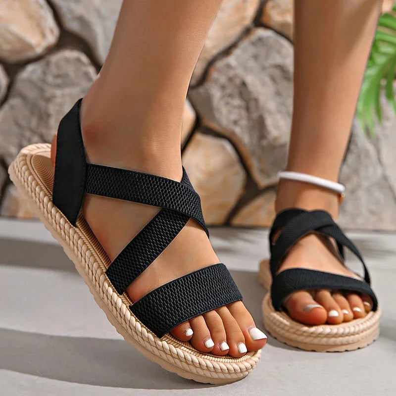 Criss-cross elastic strap espadrille sandals for women, comfortable, woven, and perfect for summer.