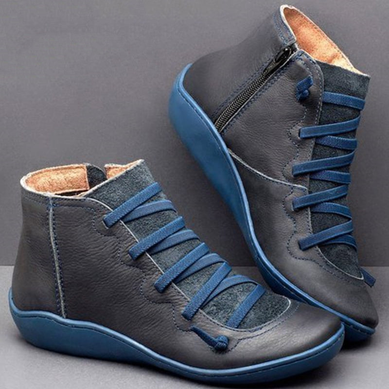 Stylish women's orthopedic ankle boots, black PU leather, designed for comfort, support, and posture correction.