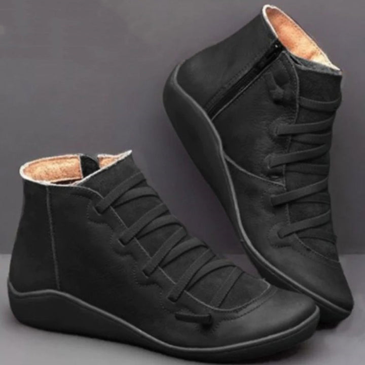 Orthopedic women's ankle boots, black, featuring a side zip for easy on/off and superior foot comfort & support.