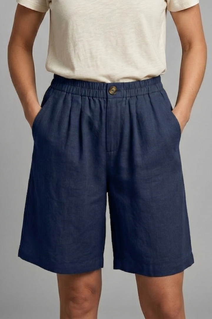 Lightweight women's active shorts with elastic waist, loose fit, and handy side pockets.