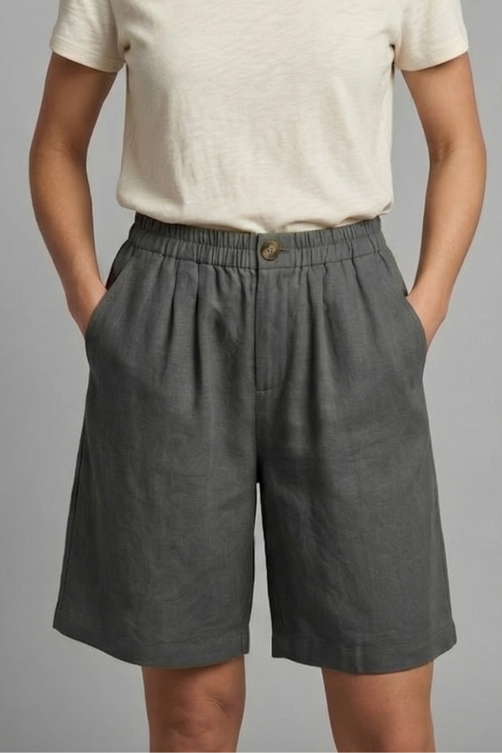 Relaxed fit women's elastic waist shorts, mid-length design for ultimate casual comfort.