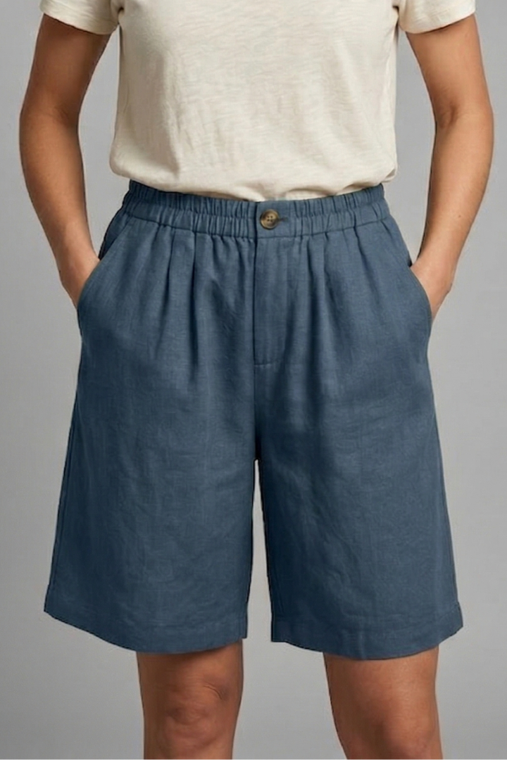 Breathable women's comfy shorts with elastic waist, loose fit, and practical side pockets.