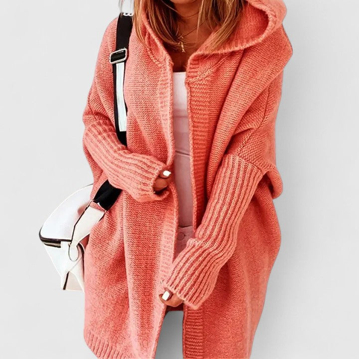 Women's comfy oversized knit hooded cardigan, perfect for cozy fall layering. Knee-length, stylish & versatile.