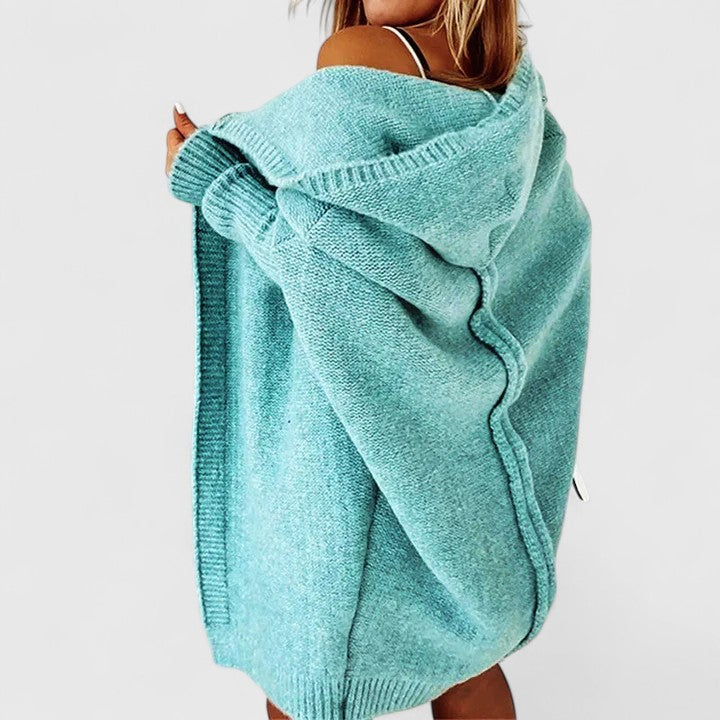 Stylish women's oversized knit cardigan with hood. Perfect for fall fashion, casual layering & chic winter outfits.
