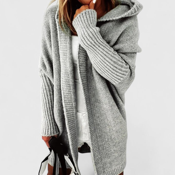 Versatile women's oversized knit hooded cardigan. Chic, cozy & comfortable, ideal for everyday fall and winter styling.