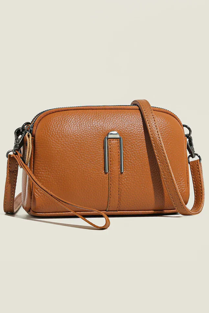 Versatile women's compact shoulder bag, double zip design for secure storage & effortless everyday wear.