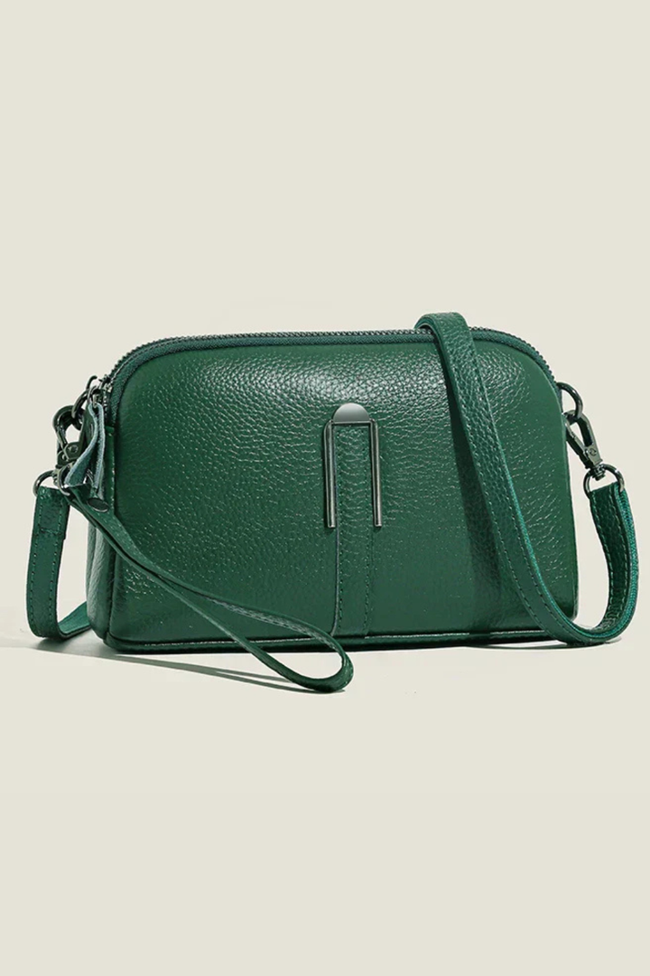 Compact women's double zip crossbody shoulder bag, stylish and versatile for modern everyday fashion.