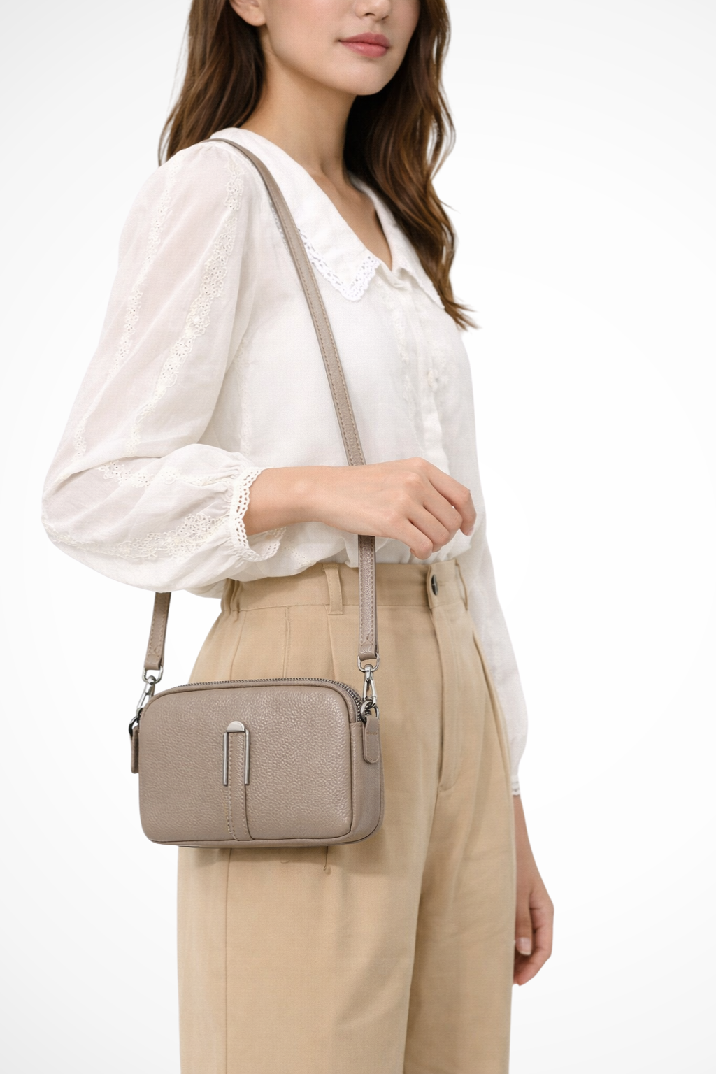 Women's everyday crossbody bag, compact double zip design & textured finish for on-the-go organization.