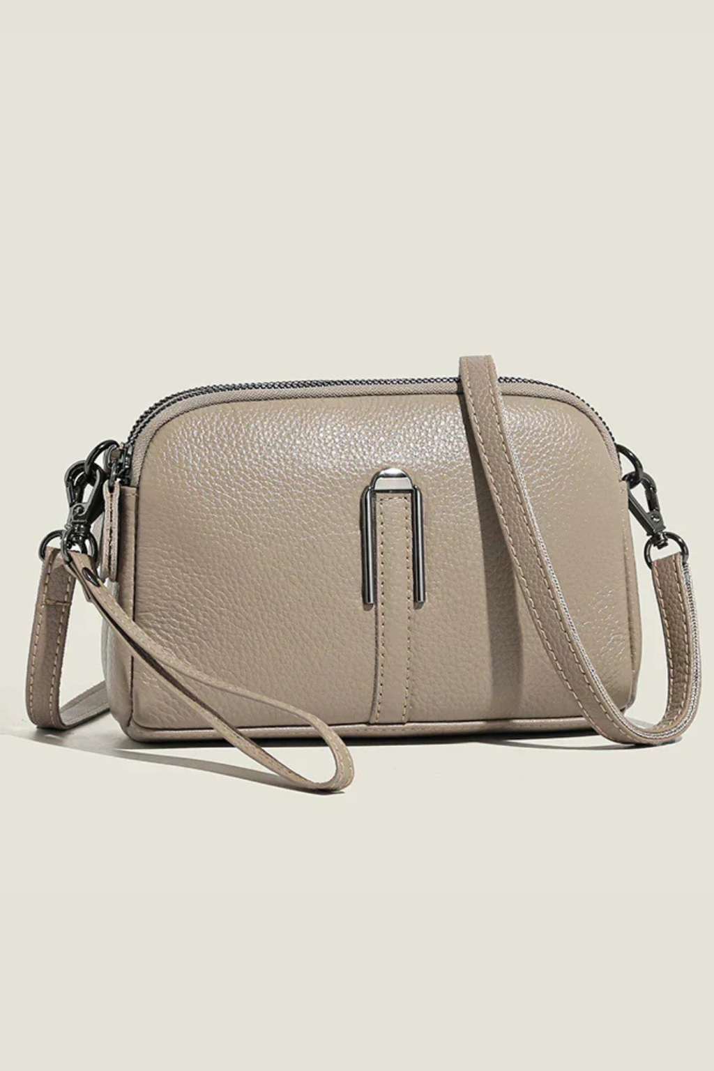 Textured women's compact double zip crossbody shoulder bag, a versatile and stylish everyday purse.