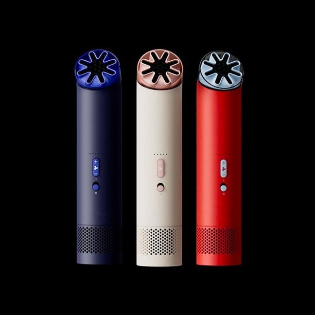 Women's cordless travel hair dryer with diffuser & ion care. Rechargeable for portable frizz control & shine boost.