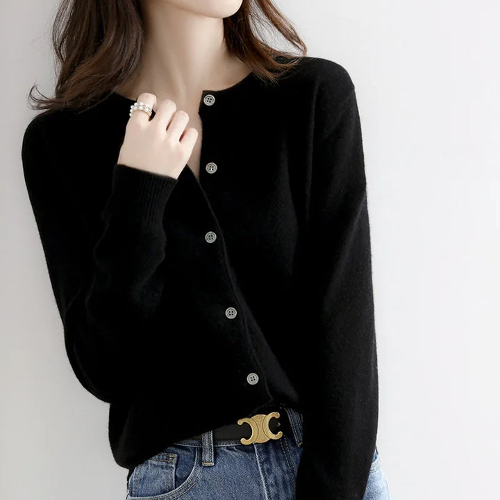 Women's cozy button-up cardigan for elegant layering. Perfect fall & winter sweater with long sleeves.