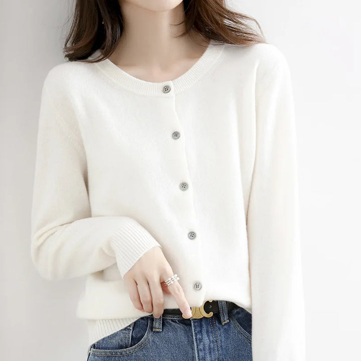 Elegant women's button-up cardigan, a must-have cozy sweater for fall fashion & chic winter layering.
